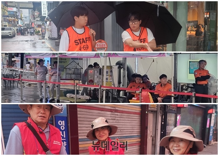 ▲ 자원봉사자와 소방대원들이 대전 0시 축제 기간에 축제장 질서와 안전을 위해 힘쓰고 있다.ⓒ김경태 기자