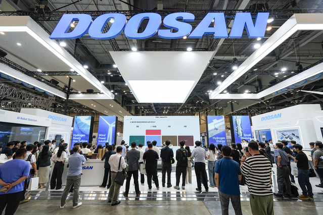 ▲ 27일부터 부산 벡스코에서 개최되는 ‘기후산업국제박람회’ 두산 부스 전경. 이번 전시회에서 두산은 가스터빈·SMR·풍력·수소 등 다양한 에너지 솔루션을 선보인다. ⓒ두산에너빌리티