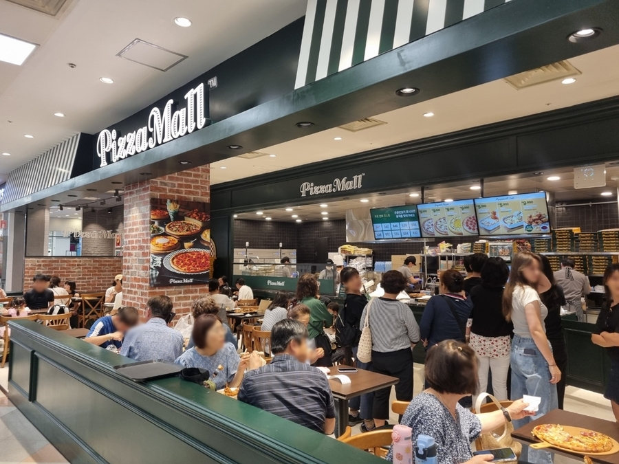 ▲ 피자몰 중계점 매장내부 '그립앤고 존'ⓒ이랜드