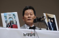 [포토] 태진아 '변장한적 없다' 증거 사진보이며 반박