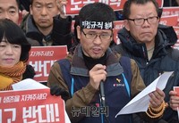 [포토] 머리띠 두르고 기자회견문 읽는 한상균