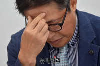 [포토] 신생아결핵관련, 고개 떨군 모네여성병원 안희성 원장