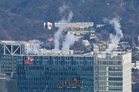 [포토] 3일 연속 한파, 도심속 피어오르는 수증기