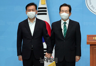 [포토] 정세균·이광재 단일화 발표