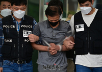 [포토] 전자발찌 살인 강윤성, 검찰 송치 "피해자에 사죄"