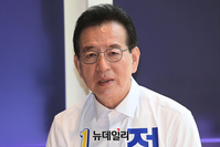 [포토] 정순균 후보 "반값 아파트 필요시 구룡마을처럼 제3부지 짓는 게 맞다"