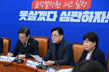[포토] 최고위 참석한 홍익표 더불어민주당 원내대표