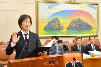 [포토] 선서하는 주병기 공정거래위원장 후보자