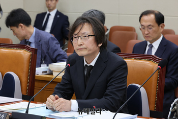 [포토] 답변하는 주병기 공정거래위원장 후보자