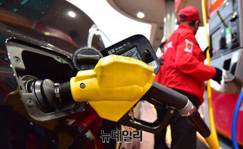 SK 주유소서 GS 휘발유도 팔라니 … 정유사들 "탁상공론"